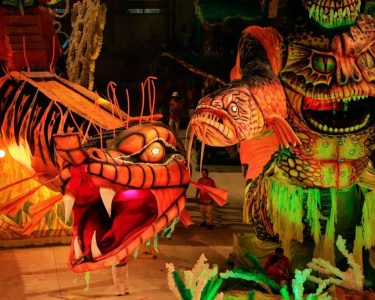 Qual é a origem do Festival de Parintins?